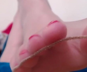 Soles in Pantyhose Close up..
