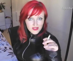 Redhead Smoking in Leather..